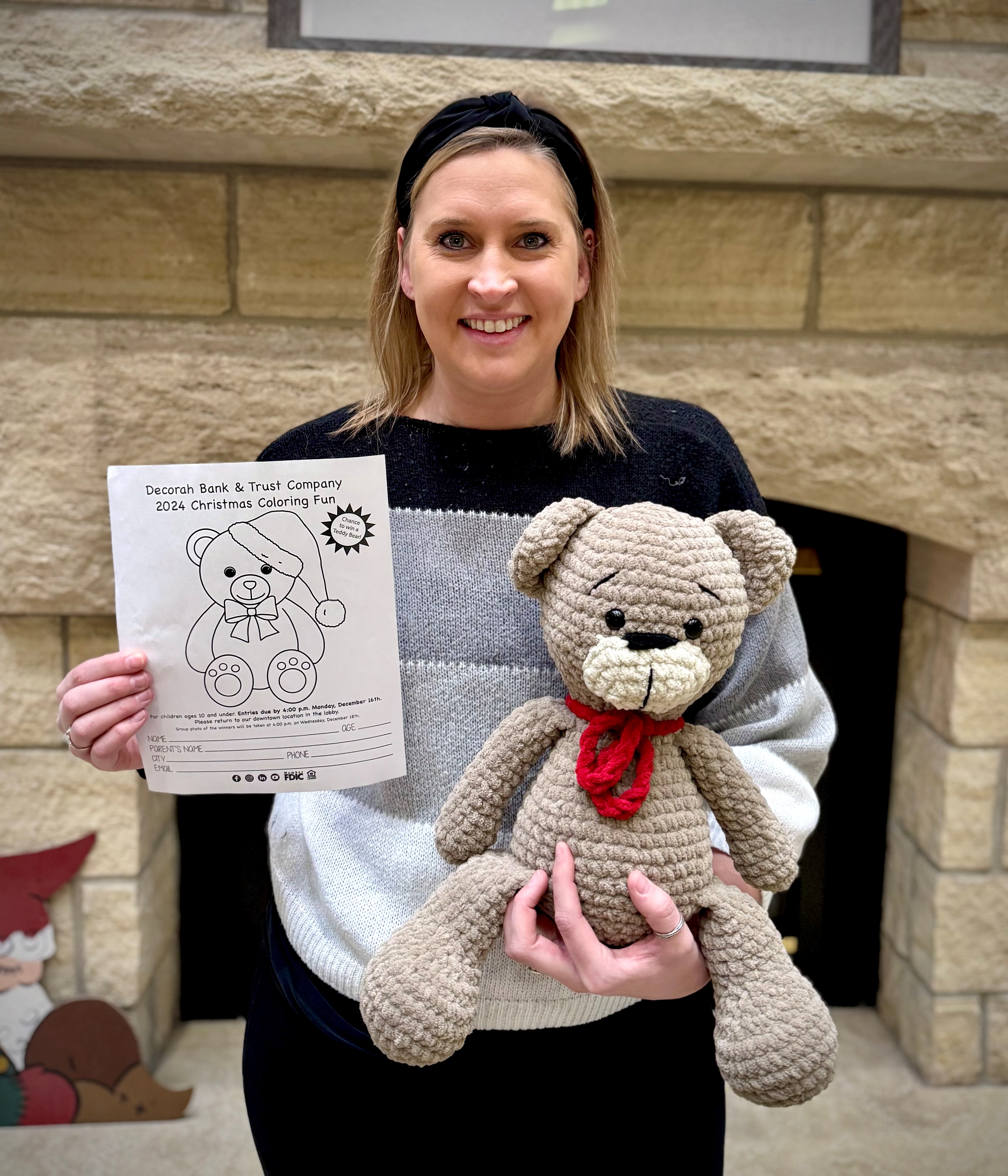 Bree Wilhelm with hand-crocheted teddy bears